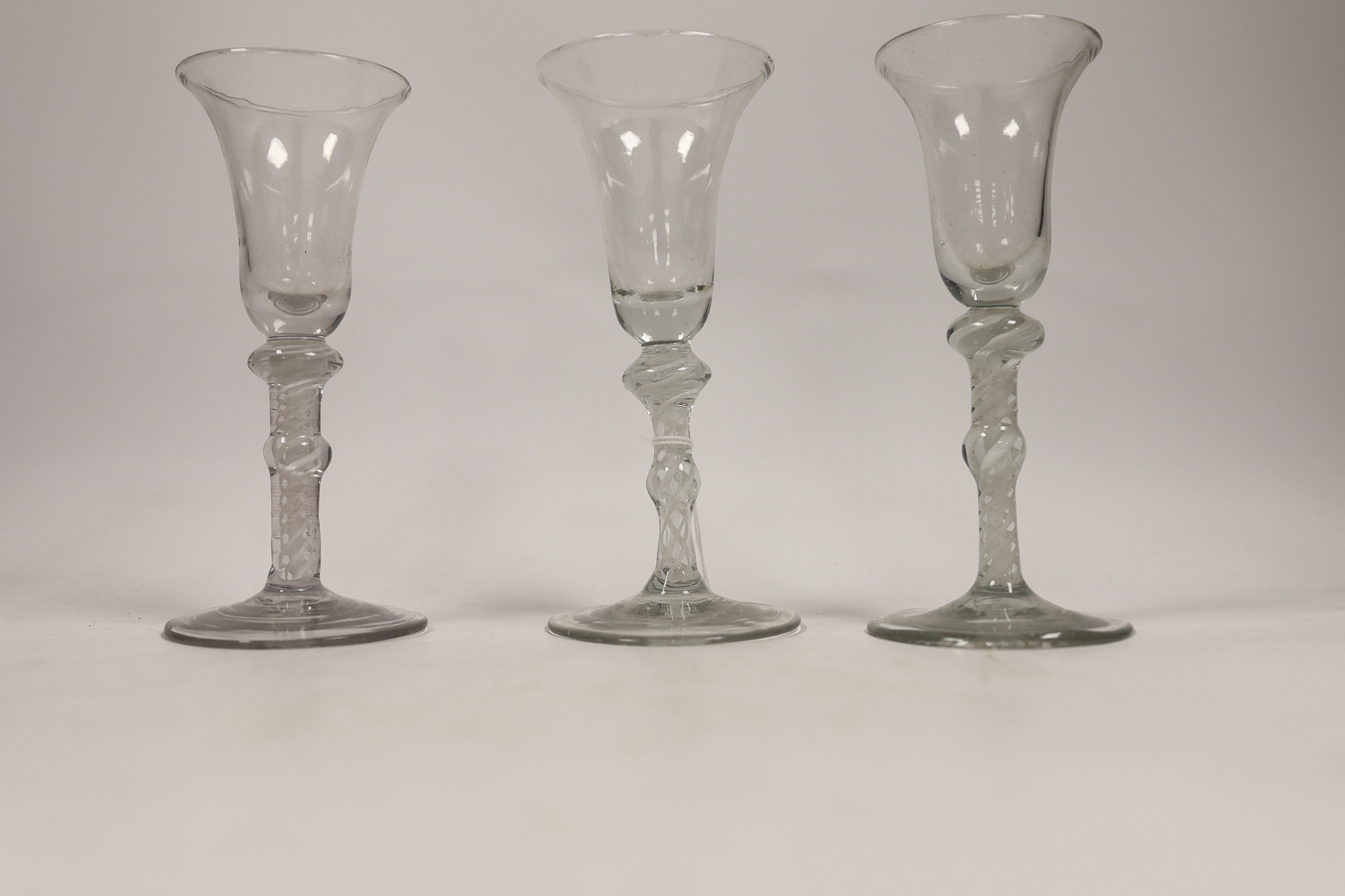 Five 19th century Dutch DSOT stem soda wine glasses, largest 17cm high